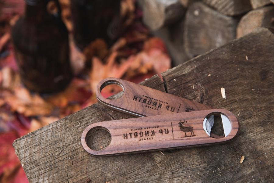 engraved bottle openers in walnut